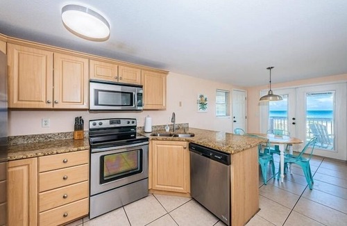 Indian Shores House | Charming Pet Friendly Beach Front Cottage with Unobstructed Million Dollar.