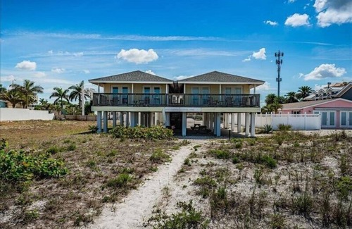 Indian Shores House | Charming Pet Friendly Beach Front Cottage with Unobstructed Million Dollar.