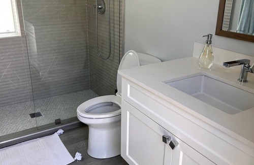 Seven Mile Beach House | Charming pool house with AC and WiFi in West Bay.
