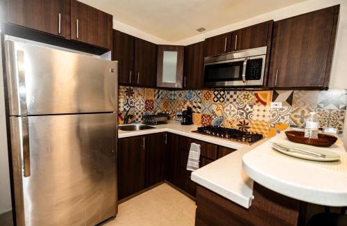 Bucana Apartment | Charming Retreat with Patio Access and FREE Laundry