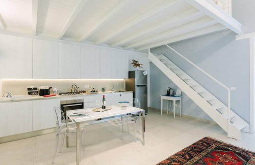 Ortigia Apartment | Charming Sea View Apartment with balcony, WiFi, Lift and 2 Bikes. Pet friendly.