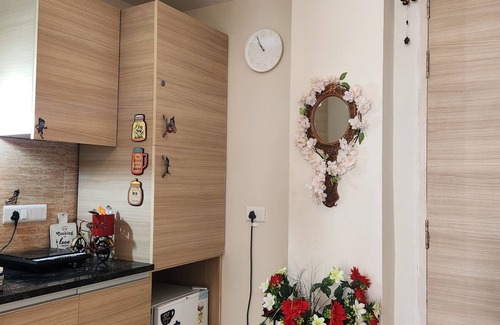 Vrindavan Apartment | Charming studio in enchanting Vrindavan with AC, kitchenette,TV & pretty Balcony