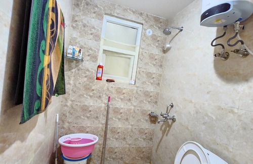 Vrindavan Apartment | Charming studio in enchanting Vrindavan with AC, kitchenette,TV & pretty Balcony