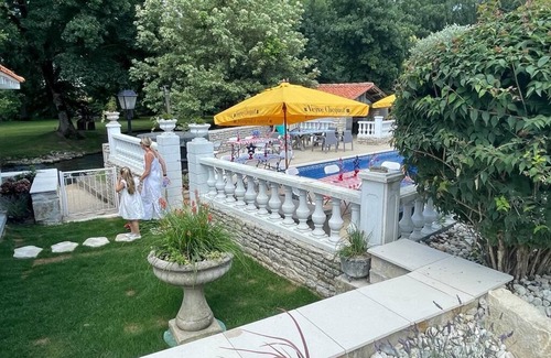 Chenon House | Charming updated and 4-bedroom mill house on the river with fantastic views.