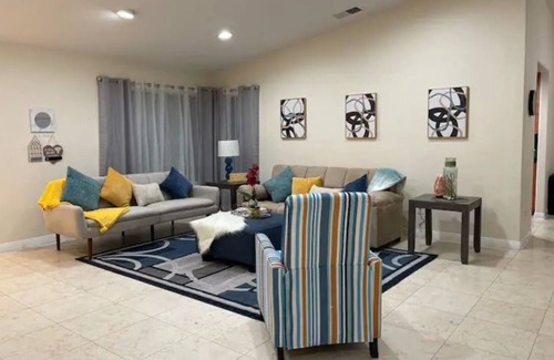 Moreno Valley House | Cheerful 4-bedroom home with fireplace