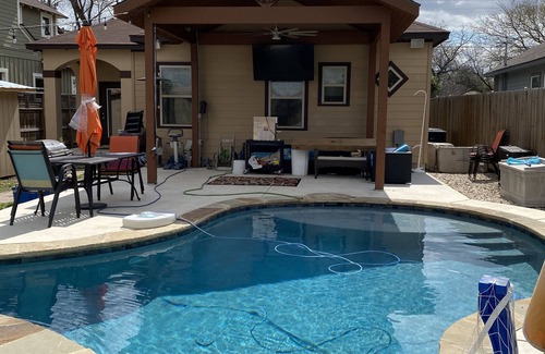 Southside House | Cheerful oasis home with pool and hot tub. 2.5 miles from downtown.