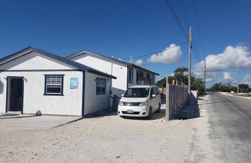 Mars Bay Settlement Villa | Cheerful one bedroom villa with a patio.