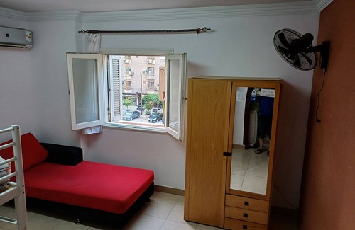 Nasr City Apartment | Chic 1-bedroom apartment with WiFi, AC in brilliant Cairo Governorate
