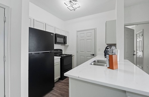 University District Apartment | Chic 2BR/2BA with Gym and Rooftop Access