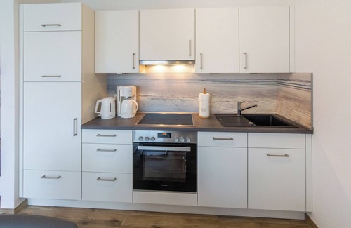 Westeraccumersiel Apartment | Chic vacation apartment Pier 29 in Dornumersiel in a quiet residential area