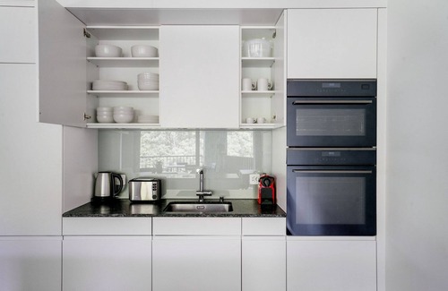 Wollishofen Apartment | Chic Wollishofen 1BR w/Storage & W/D, nr Local Market, by Blueground