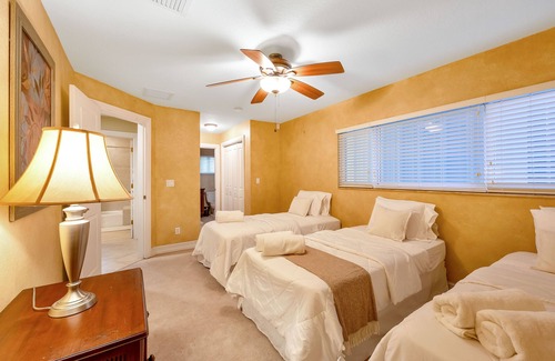 Parkland House | City Oasis is a Gorgeous Home with a Pond, Pool table, Poker, and Heated Pool!