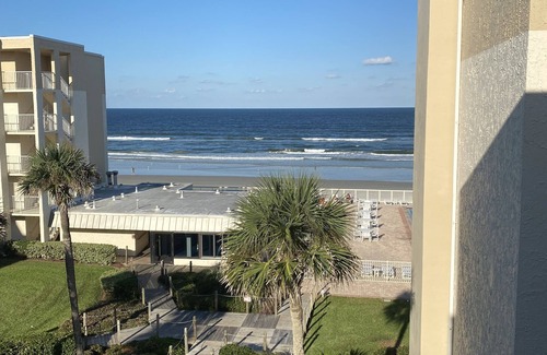 New Smyrna Beach Condo | Classic Comfort with Ocean View