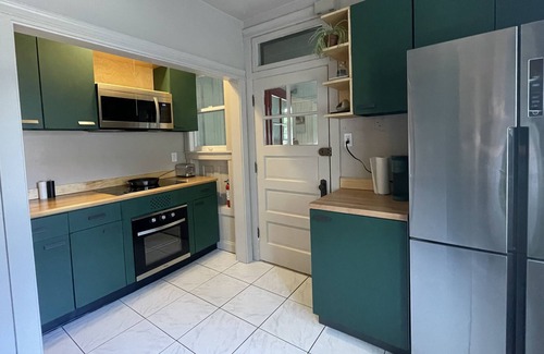 Irving Park Apartment | Classic Flat with Modern Upgrades and Plenty of Space. Blue Line Friendly.
