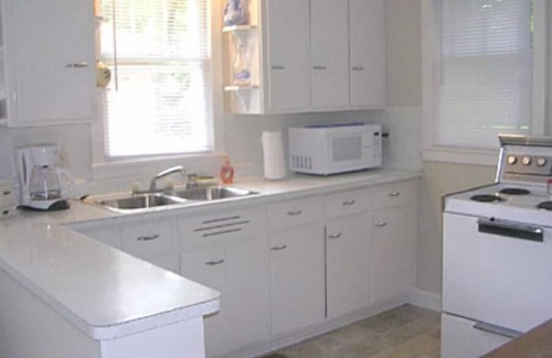 Markesan Cottage | Classic Green Lake cottage, lakefront, screened boathouse deck, dock, swimming