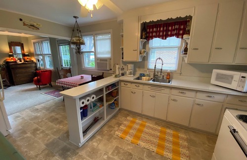 Markesan Cottage | Classic Green Lake cottage, lakefront, screened boathouse deck, dock, swimming