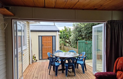 Te Akau House | Classic Kiwi Bach at Sunset Beach