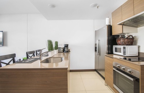 Pavas Apartment | Classy Apartment w/King Bed Close to Airports