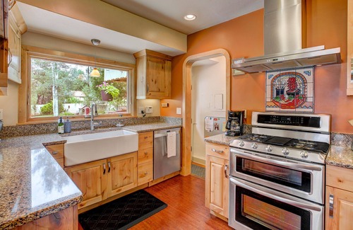 Central Colorado Springs House | CLEAN, COMFORTABLE, and CHARM! Guests love our hot tub, gas grill and fire-pit!