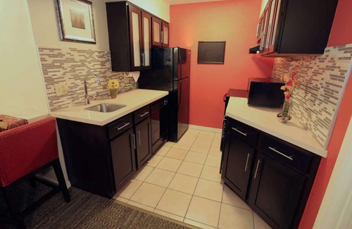 Florida Central Atlantic Coast Hotel | Close to SeaWorld Orlando! TWO 2BR Suites with Kitchens, Pool, Pets Allowed!