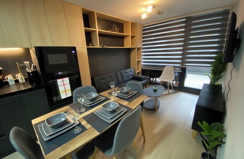 Puerto Varas Apartment | Coastal apartment, steps from the beach. Heated swimming pool, jacuzzi and patio