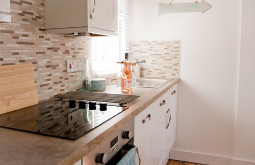 Cowes House | Coastal cottage with sea views, lovely village location, 2 mins from seafront.