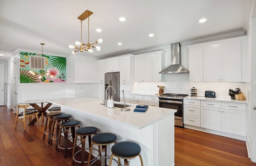 Isle of Palms Villa | Coastal oasis: heated pool, rooftop, putting green + walk to the beach