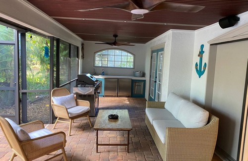 Fruitville House | Coastal Tropical Oasis With Salt Water Pool