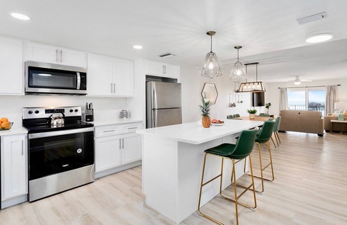 Port Canaveral Condo | Cocoa Beach Towers by Happy Palm Stays