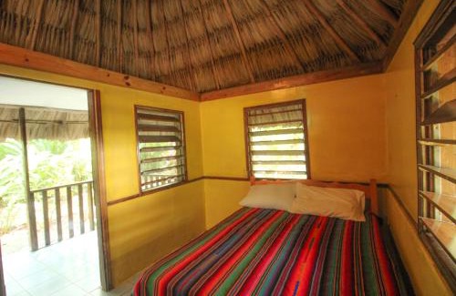 Bullet Tree Falls Resort | Cohune Palms River Cabanas