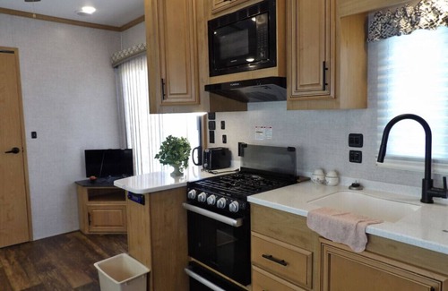 Rumsey House | Come and Stay at the Island this Property adjoins Island Paradise.