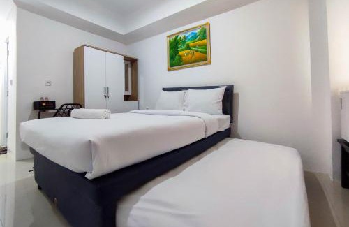 Jatingaleh Apartment | Comfort and Well Design Studio at Paltrow City Apartment By Travelio
