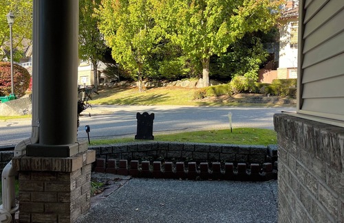 Westwood Plateau House | Comfort room with an ensuite full bath in a beautiful Westwood Plateau home