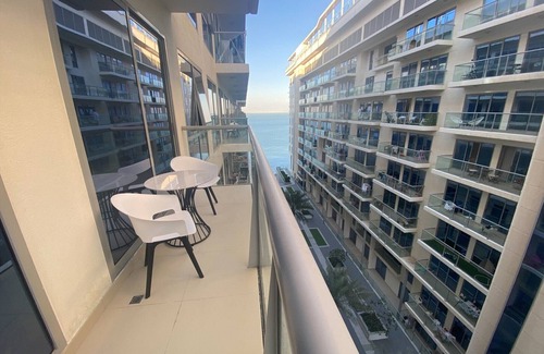 Ras Al Khaimah Apartment | Comfortable 2-bedroom vacation Apartment at Beachfront Marjan Island UAE Living