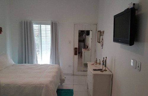 Enseada Hotel | Comfortable Delphin hotel suite Foot in the sand