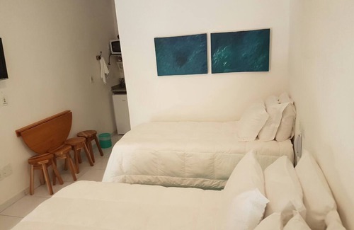 Enseada Hotel | Comfortable Delphin hotel suite Foot in the sand