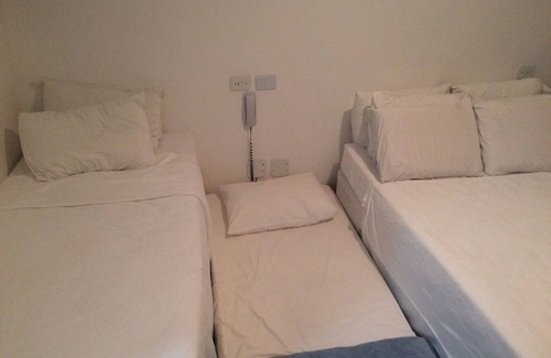 Enseada Hotel | Comfortable Delphin hotel suite Foot in the sand