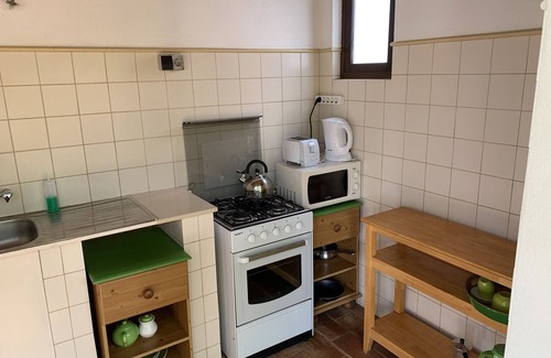 Lagos Cottage | Comfortable Double Room with Outdoor Kitchen and Shared Pool