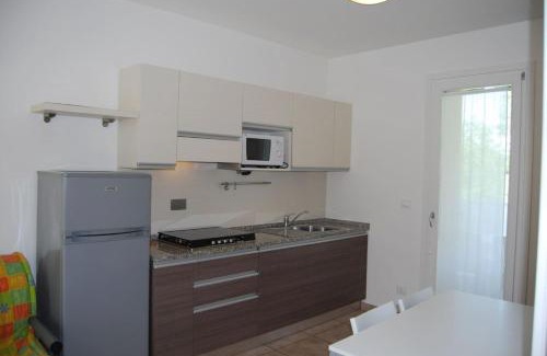 Bibione Apartment | Comfortable flat in a residence with swimming pool