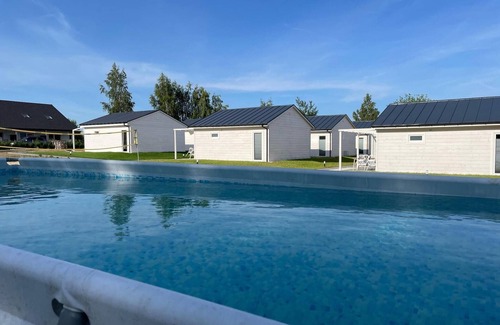Mielno House | Comfortable holiday homes with a summer pool