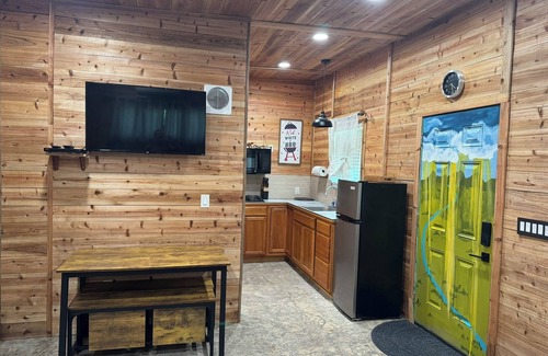 Cibolo Cabin | Comfy cabin at edge of 180 acre nature park w/pool, pickleball & volleyball