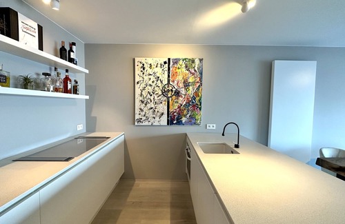 Knokke Apartment | comfy design apartment with garden and sea view