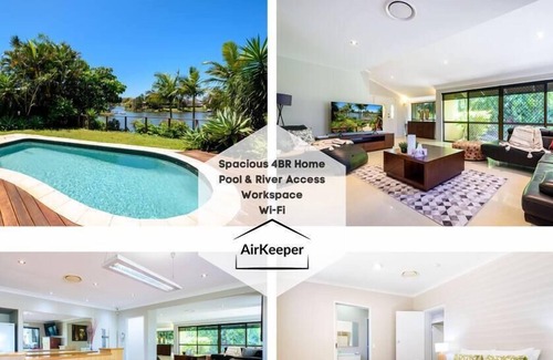Carrara House | Complete Waterfront Family Retreat / Carrara QLD