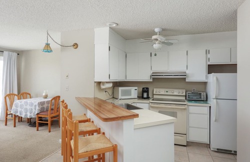 Seaside Heights Condo | Condo on the beach with private patio overlooking the ocean.