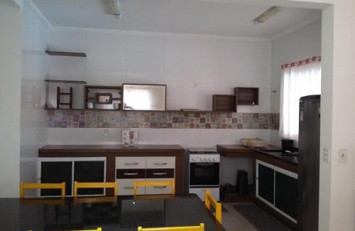 Ilha Comprida House | Conforto Laranja