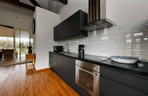 Santa Cruz House | Connect with nature through a mix of luxurious and striking details.