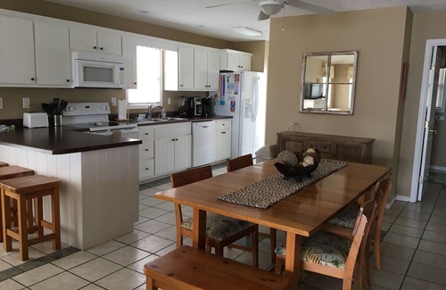 Fort Morgan House | Conveniently located between beach & community pools, tennis court; dog friendly