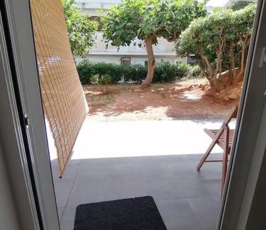 Saronida Apartment | Cosy and Relax Studio by the sea, with garden