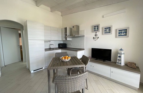Paduledda Apartment | Cosy apartment for 4 guests with pool, TV, pets allowed and parking