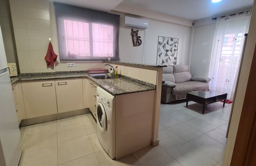 Miramar Apartment | Cosy beach flat (ground floor) with terrace, AC, Heating and fast WiFi